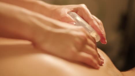 professional massage therapist performing relaxation massage