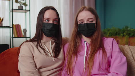 girls friends siblings family wear face medical mask to prevent respiratory infection coronavirus