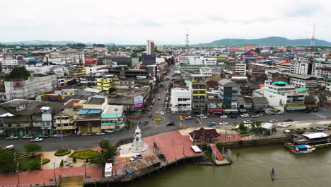 City-centre-of-Surat-Thani-in-Thailand,-aerial-orbit-view