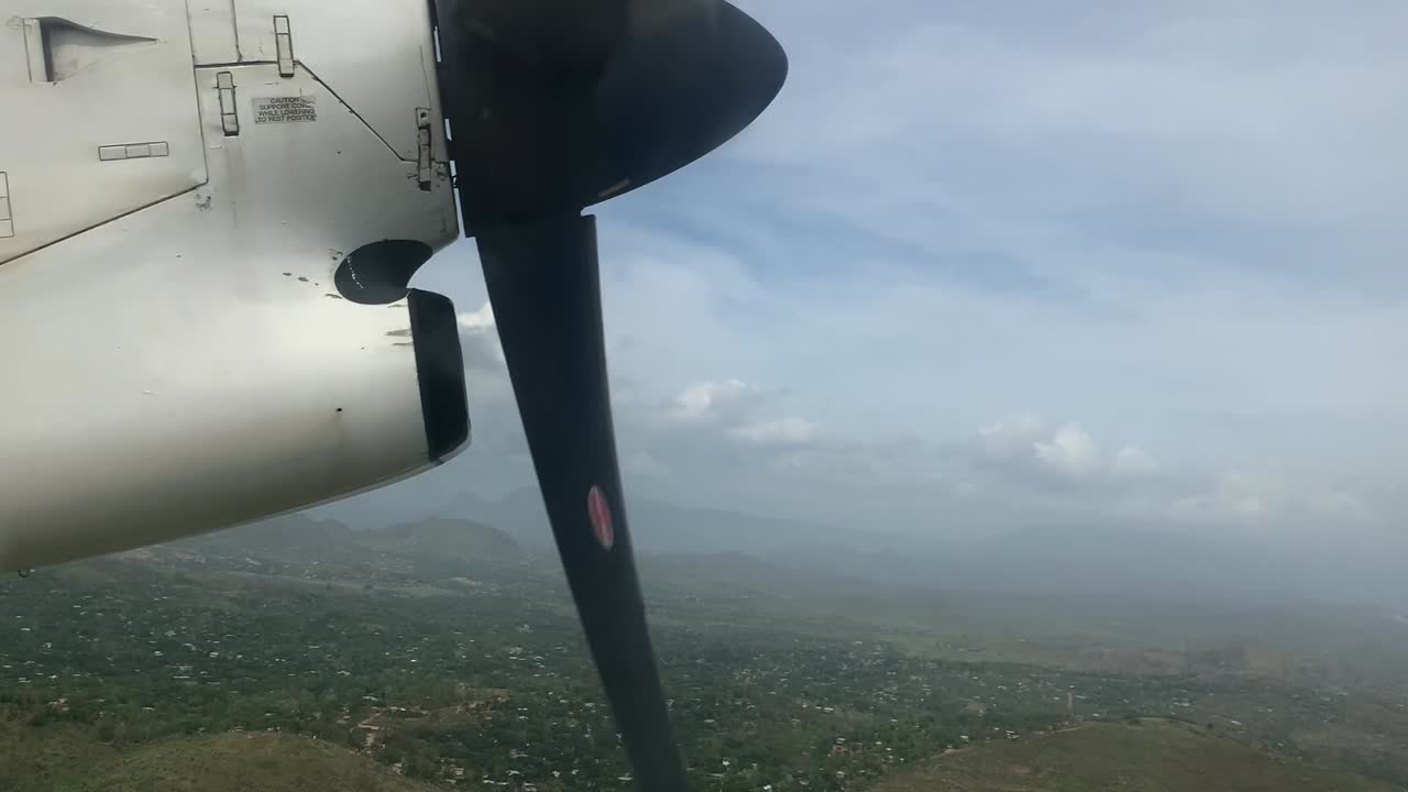 View from the window of a small plane flying over Papua New Guinea