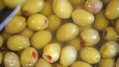 preserved green olives with red pepper