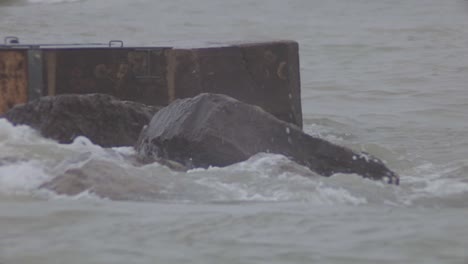 Intense-Sea-Waves-Splashing-On-The-Big-Rocks-In-Slow-Motion-In-Canada---Closeup-Shot