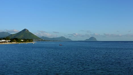 Mauritius-Island-Coastline,-Aerial-View-of-Exotic-Coast-and-Rainforest-by-Indian-Ocean,-Drone-Shot