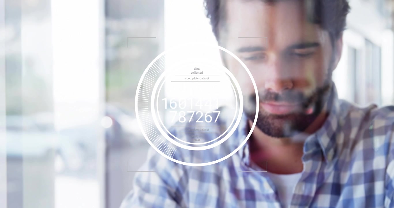 Male lifting tablet swiping technology HUD updating dataset and glancing outside window