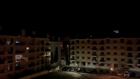 wide-view-of-New-Years-Eve-fireworks-at-Carcavelos-village-near-Lisbon,-Portugal,-Cascais