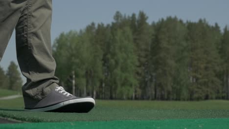 golfer getting ready to tee off