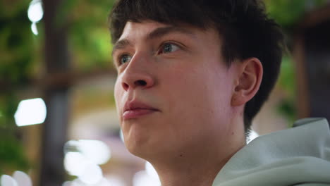 subtle expressions showing engagement and emotion, shallow focus on mouth and gesture, indoor conversation setting with blurred background, attentive atmosphere conveying connection and nuance