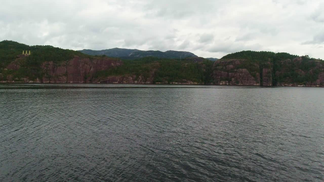 Overcast Skies and Coastal Wonders on an European Boat Tour Delight