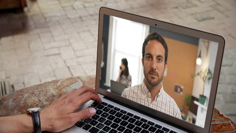 man having a video conference