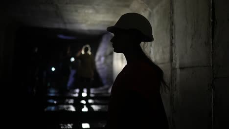 worker in an underground tunnel