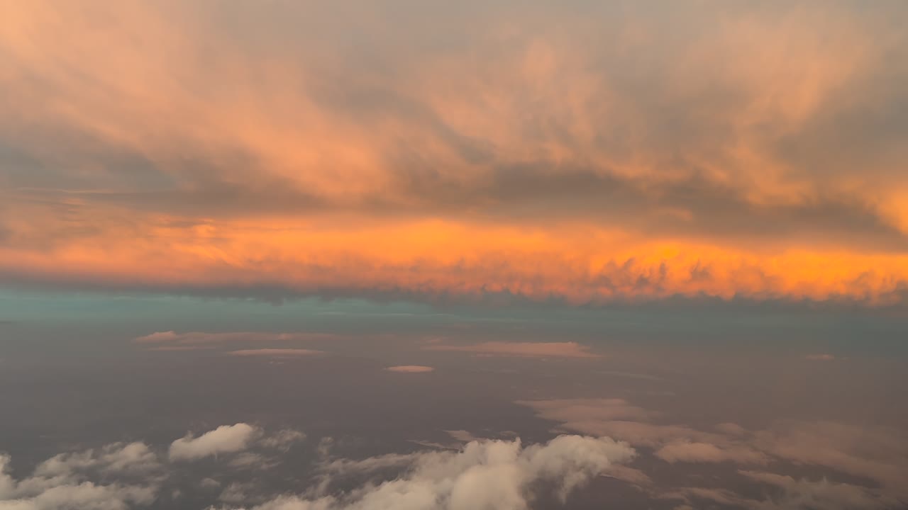 Stunning Aerial Sunset View Over Clouds