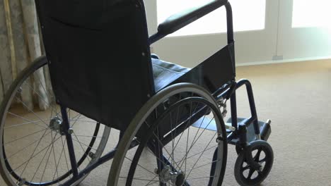 empty wheelchair in bedroom