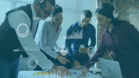 collaborating over data charts, business team analyzing digital analytics in office