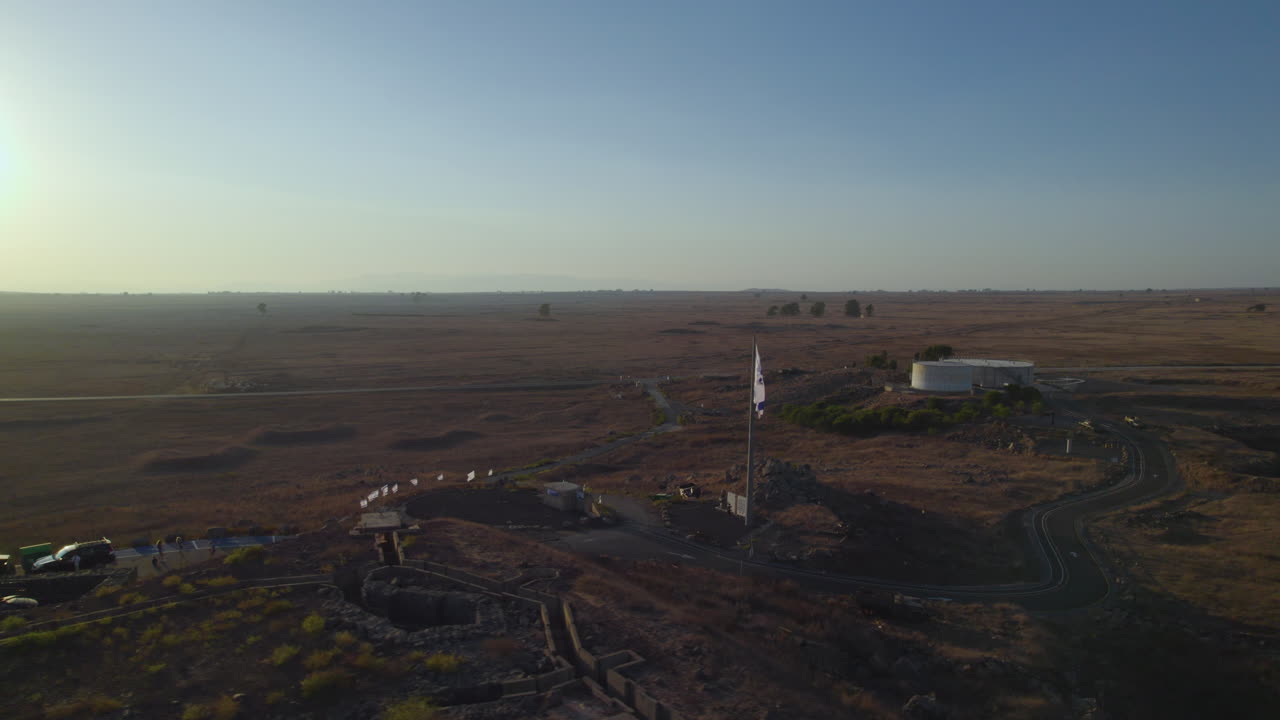 The Israeli flag at Mitzpe Tel Saki, it's an underground IDF bunker against the Syrian army in the Golan Heights - Parallax shot