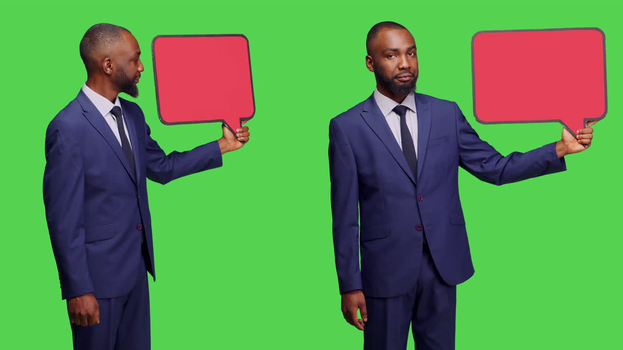 African American businessman presenting a speech bubble on a green screen