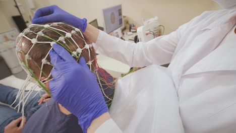 patient brain testing using encephalography at medical center