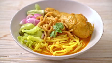 northern thai noodle curry soup with chicken - thai food style