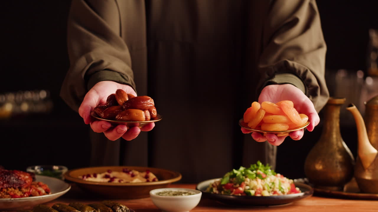 Woman Serving Dates and Apricots