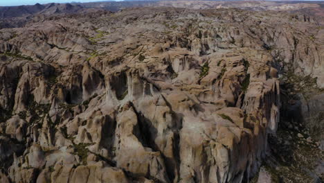 AERIAL---Epic-view-of-Ischigualasto-Provincial-Park,-San-Juan,-Argentina,-spinning-shot