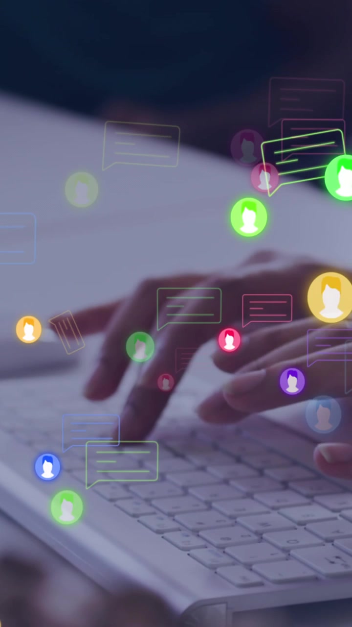 Animation of chat message icons over hands of woman using computer keyboard