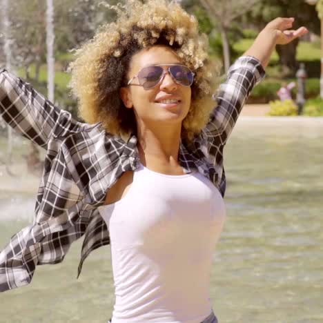 happy young woman in sunglasses