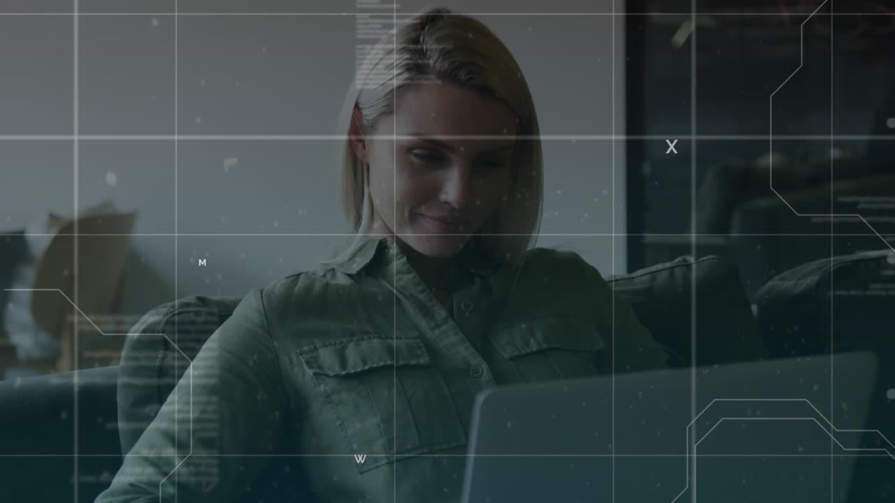 Animation of data processing over caucasian businesswoman using laptop