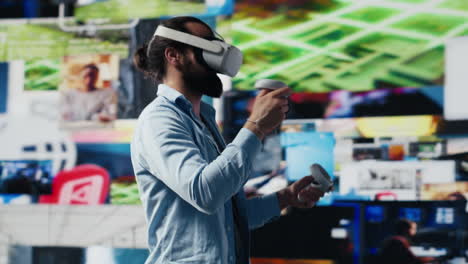 young relaxed guy uses vr glasses for a 3d user interface design