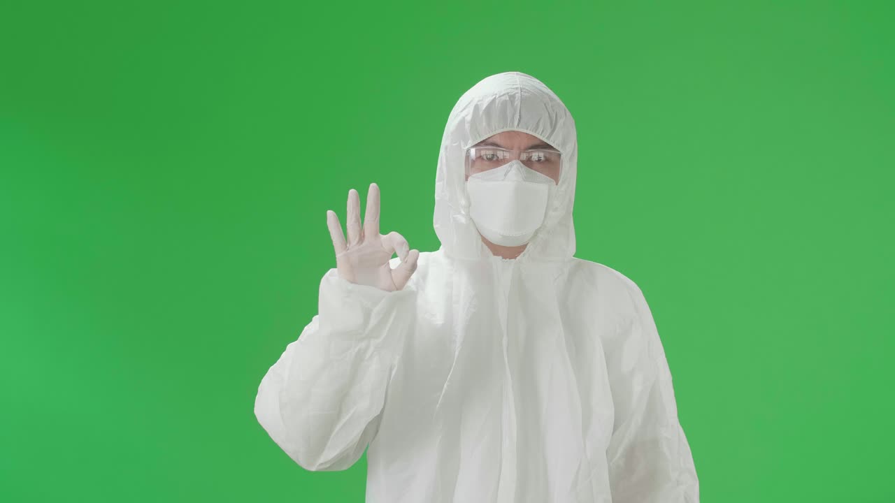 Person in Protective Gear Giving Ok Sign