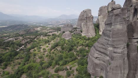 Aerial-forward-view-over-magnificent-rocky-peaks