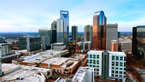 low-rise architecture neighboring with beautiful modern skyscrapers. cityscape of charlotte, north carolina, usa from top