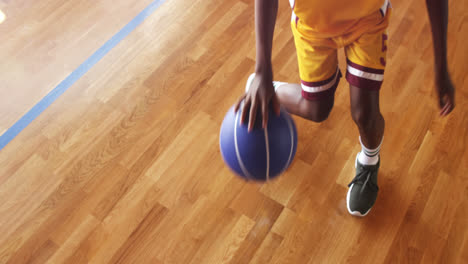 basketball player practicing dribbling drill