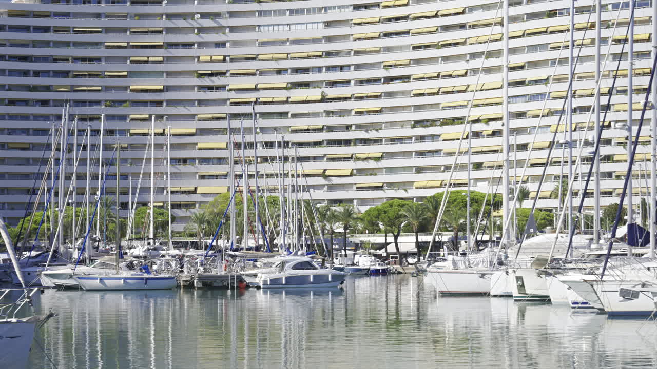 Villeneuve-Loubet, France - June 7, 2025: Boats docked in the Marina Baie des Anges in daylight