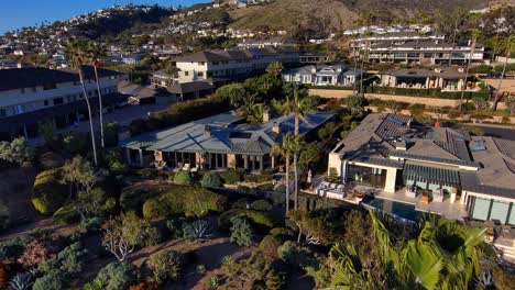 aerial reveal of high end housing in laguna beach, california