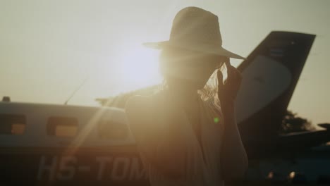 woman at sunset airport