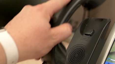 a close up of a hand slamming an office phone down onto the phone receiver in slow motion