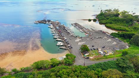 boats docked at the he'eia kea small boat harbor in kāne'ohe bay, oahu