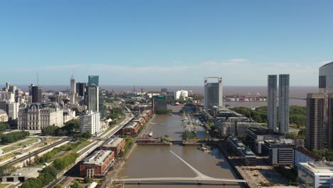 aerial over rio darsena in puerto madero