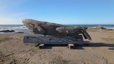 gimbal panning shot of a whale sculpture at the noyo headlands in fort bragg, california. 4k