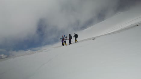 hikers on a snowy mountain