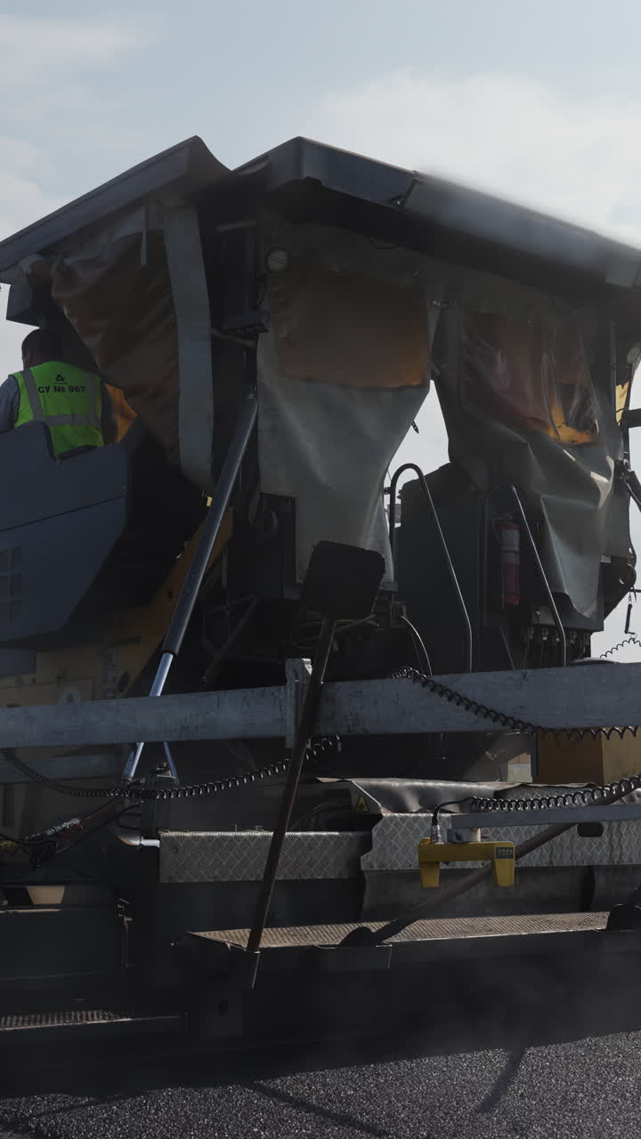 Road Paving Machine with Workers