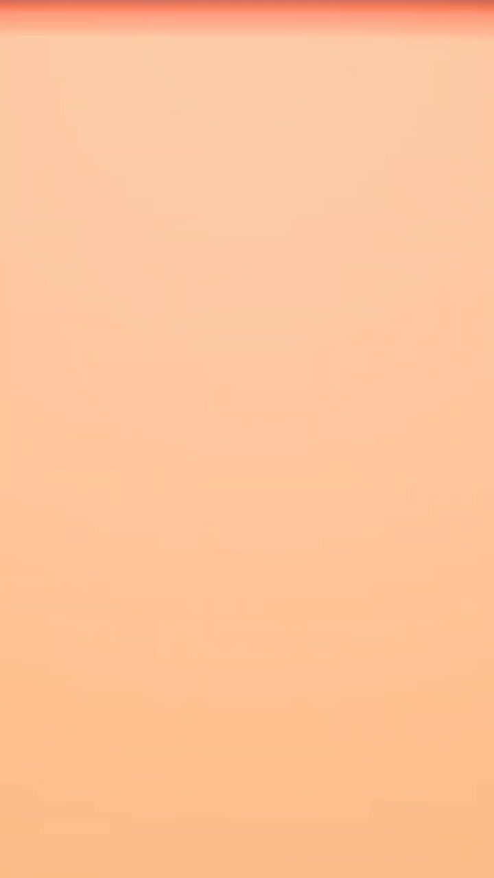 Dynamic Orange Color Reveal Transition on Dark Background