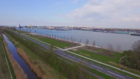 cargo ships at the port of terneuzen, netherlands, going to ghent in belgium