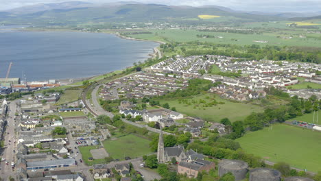 Dolly-zoom-shoot-while-turning-above-its-of-Invergordon,-Scotland-Revealing-beautiful-Scottish-nature