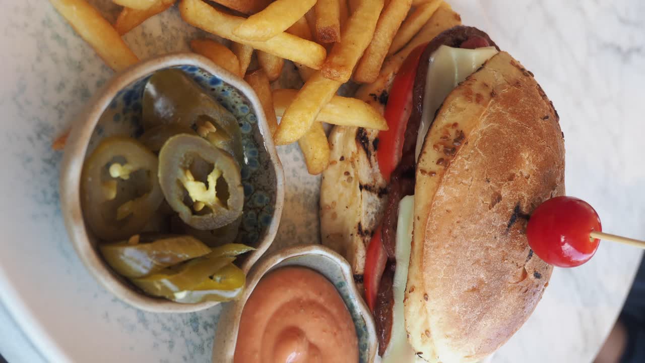 Burger, Fries, and Jalapenos