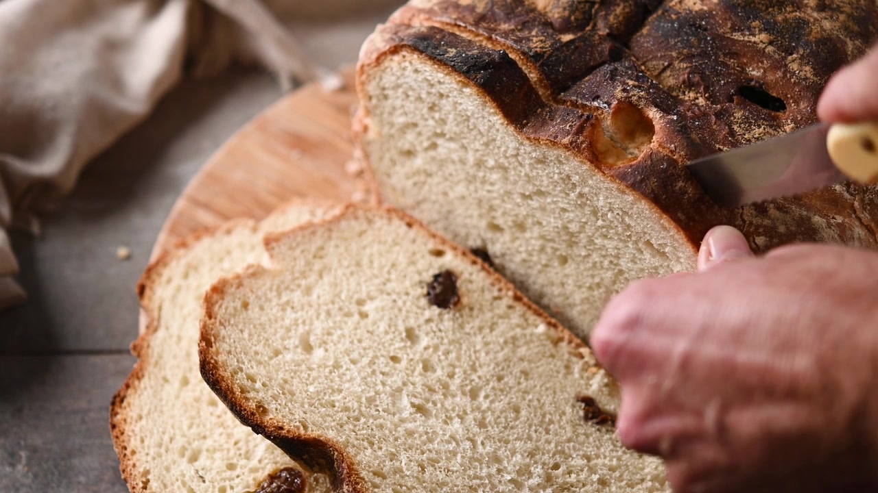 Cutting Irish Soda Bread for St Patrick’s Day