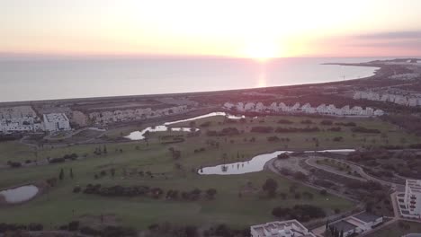 coastal golf course community at sunset