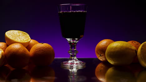 glass of drink with citrus fruits