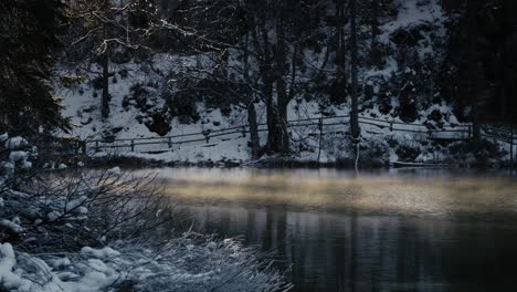 Immerse-your-audience-in-a-mist-covered-lake-illuminated-by-the-first-light-of-day