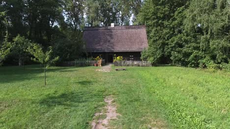 Low-Angle-Drone-Shot-Of-Beautiful-Old-Country-House