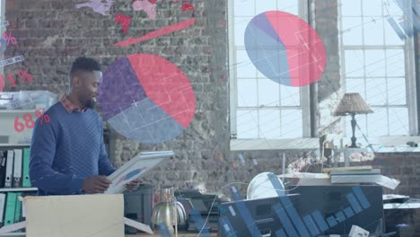 animation of data processing over happy african american businessman in office